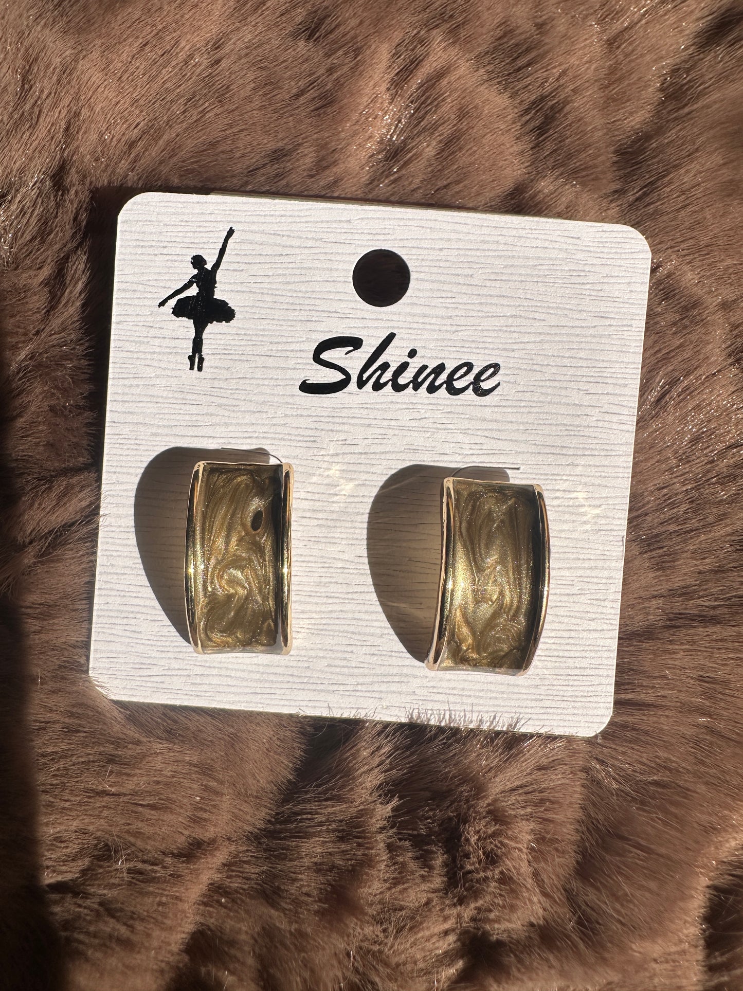 Golden enamel earring